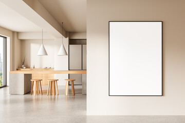Modern interior with kitchen and large blank framed poster on beige wall in bright minimalist space...