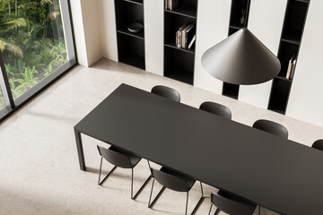 Modern minimalist interior with sleek furniture and built-in shelves, bright natural lighting from...