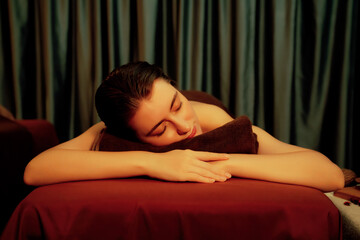 Caucasian woman customer enjoying relaxing anti-stress spa massage and pampering with beauty skin...