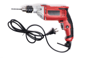 Electric drill with cord on white background. Closeup.