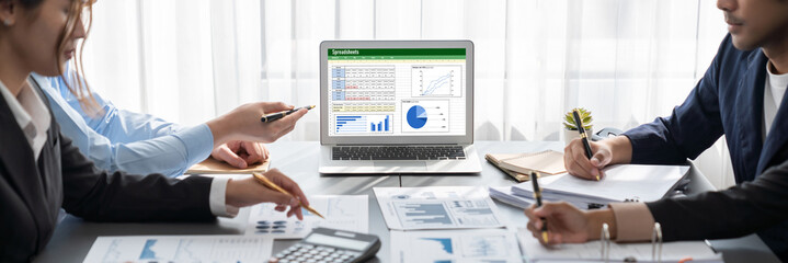 Business intelligence and data analysis concept. Analyst team working on financial data analysis...