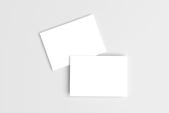 Postcard A6 for mockup isolated on gray background. Blank white 3D rendering
