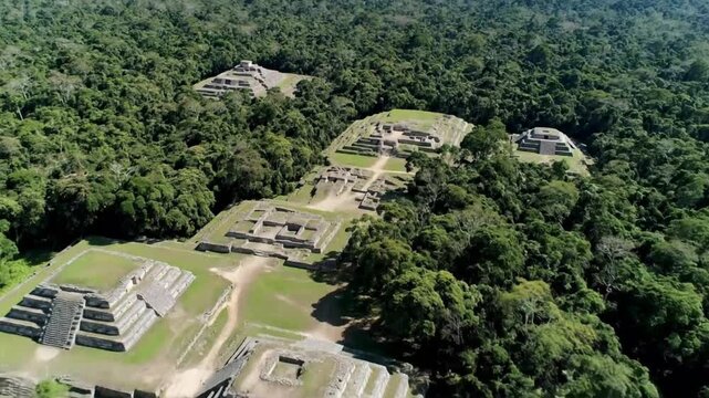 Discovering the lost Mayan city of Kohunlich nestled deep within a dense rainforest with aerial perspective and bright