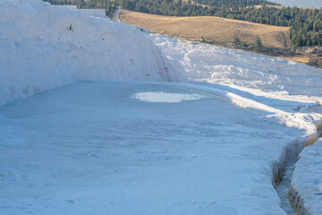 Pamukkale Travertine Terraces Showcasing Natural Beauty in Turkey During Daytime With Clear Blue Water Reflecting the Sky