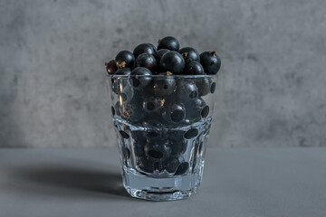 Fruits and berries. Blackcurrant as a source of vitamins. Immunity products. Juicy black berries. Healthy dessert. Vegetarian menu. Ingredient for a pie or cake.