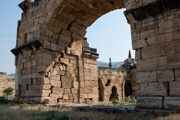 Explore the Ancient Ruins and Striking Architecture of Pamukkales Historical Site Amid Serene...