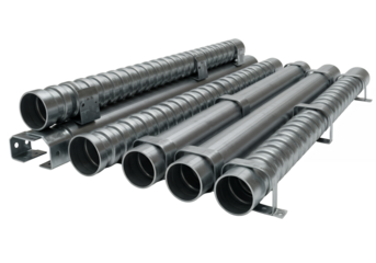 Stacked shiny metallic pipes with mounting brackets set against a black background