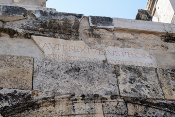Exploring the Ancient Ruins of Pamukkale With Inscriptions on Stone Walls and Historical...