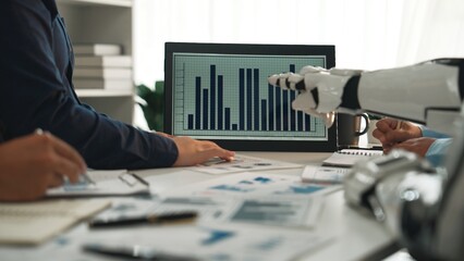 A dynamic scene showcasing a collaborative business meeting where human hands and a robotic arm...