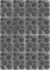 Empty egg carton in a grid pattern on white background  