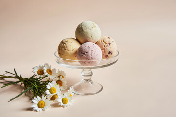 Pastel ice cream and daisies flat lay.