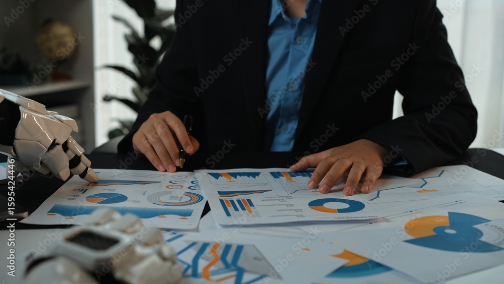 Poster a business professional uses a robotic arm to analyze financial reports and charts, showcasing moder