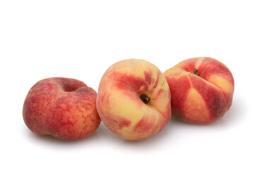 Three fig peaches isolated on white background