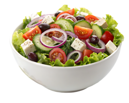 Close up of a greek salad in a white bowl with lettuce tomato cucumber onion olives and feta cheese