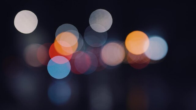 Defocused passing traffic at night bokeh