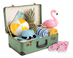 A vintage suitcase filled with beach essentials like a ball, flamingo float, and hat for a summer vacation