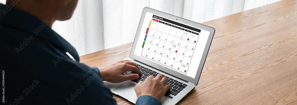 Poster calendar on computer software application for modish schedule planning for personal organizer and on