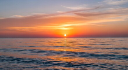 Fototapeta premium A breathtaking sunset over the ocean with vibrant colors in the sky