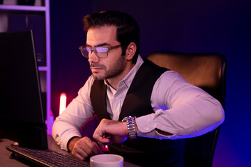 Smart businessman remotely working on desk with research target market in service product database...