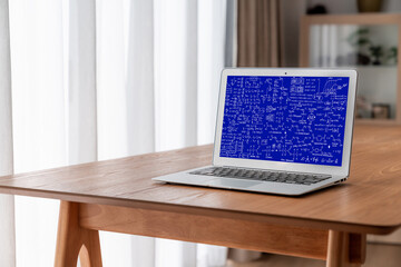 Mathematic equations and modish formula on computer screen showing concept of science and education