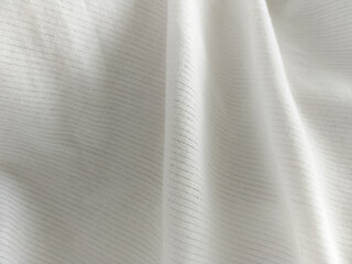 White Fabric Surface with Fine Horizontal Lines and Subtle Sheen