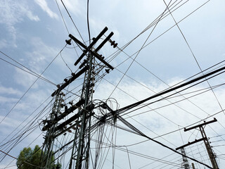Power Line Infrastructure with Multiple Wires, Pole, and Overcast Sky