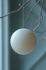 Serene Minimalist Sphere Hanging from Branches