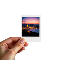 Fototapeta premium Hand Holding Vintage Photo of City with Transparent background