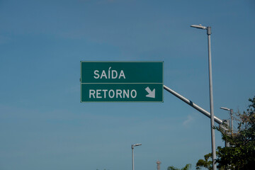 Exit and return signs clearly guide drivers, indicating safe detours and correct access points to...