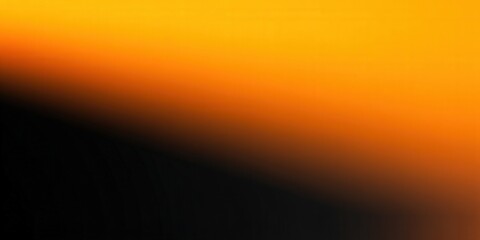 A stunning gradient background of yellow and orange colors fading into black creates a captivating visual.