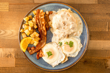 Fried eggs, bacon and sausage gravy