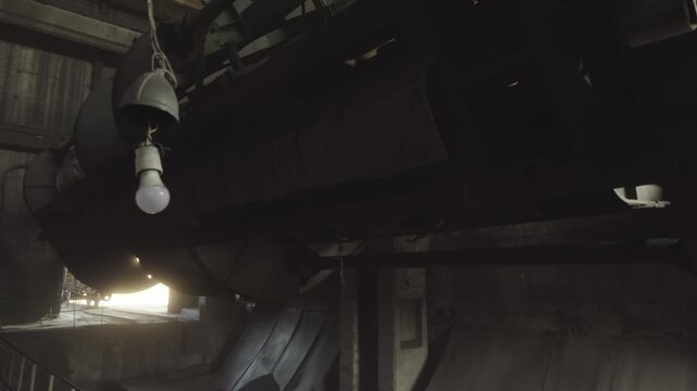A powerful wagon tipper unloads a railway wagon carrying coal