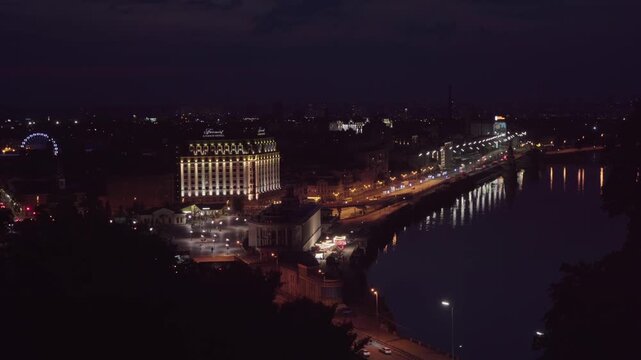 Time lapse. Kyiv in the evening. View of Podil, the old part of the city near the river.	