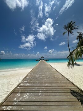 tropical beach with wooden bridge