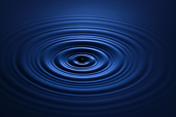 Concentric blue water ripples creating a circular pattern
