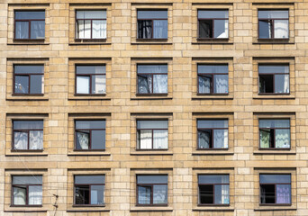 facade of a building full of windows, soviet architecture