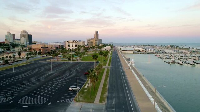 Aerial view of corpus christi skyline at sunset from across the bay
