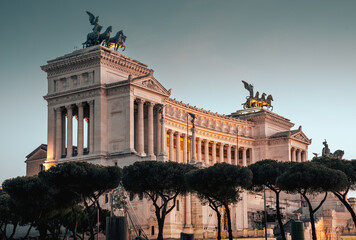 Naklejka premium View of the Altare della Patria. The famous building in Emmanuel II Square illuminated at night.
