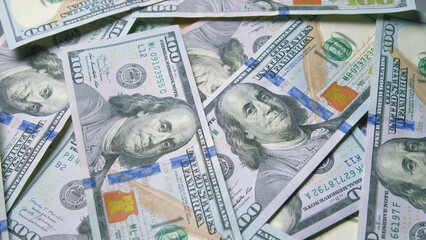 Stacks of Cash A Large Collection of U.S. Dollar Bills Piled Together Neatly and Organized