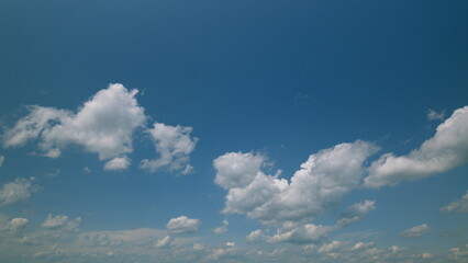 Time lapse. A Beautifully Cloudy Sky Presenting a Bright Blue Background on a Lovely Afternoon