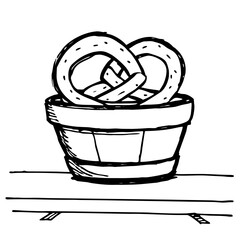 Fototapeta premium Pretzels in a wooden basket on table with minimalist design 