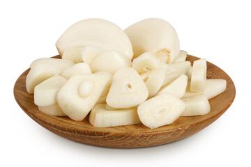 garlic cloves slices in wooden bowl isolated on white background close up