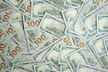 Big amount of american USD hunderd dollar bills banknotes close up
