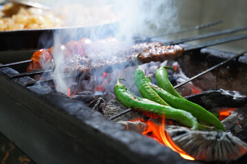 Adana kebap on the grill