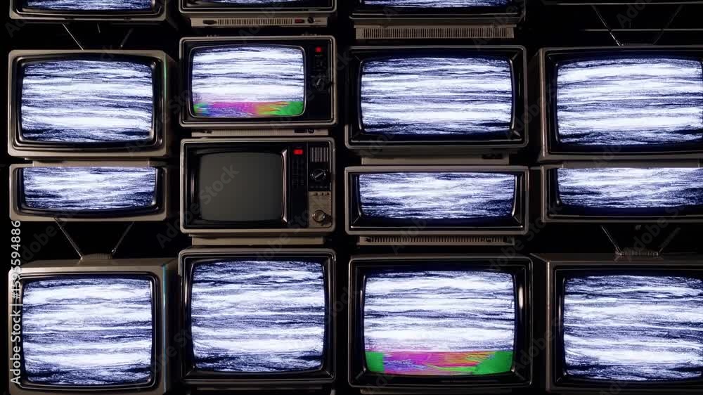 Wall mural vibrant retro television array a colorful spectacle of yesteryears technology stock image.