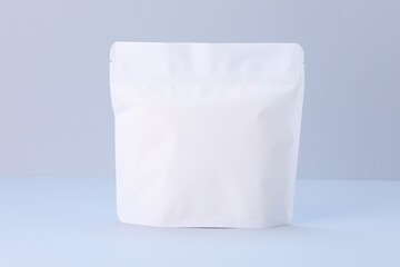 One zipper stand-up pouch on light grey background. Mockup for design