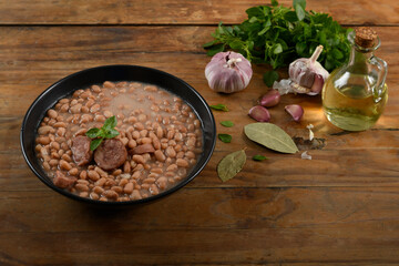 Brazilian beans with sausage and rice, side dishes and presentation
