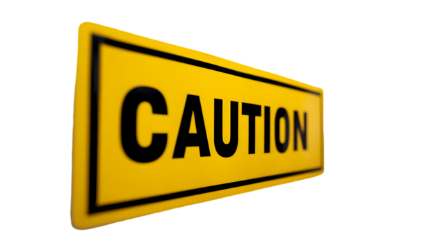 A yellow caution sign with black border and black text on a black background in a tilted view