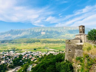 Fortress Wall Overlooking City in Mountain Valley
