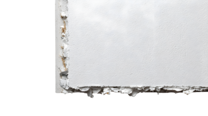 Close up of a white wall with peeling paint and visible damage on the edges and corner sections